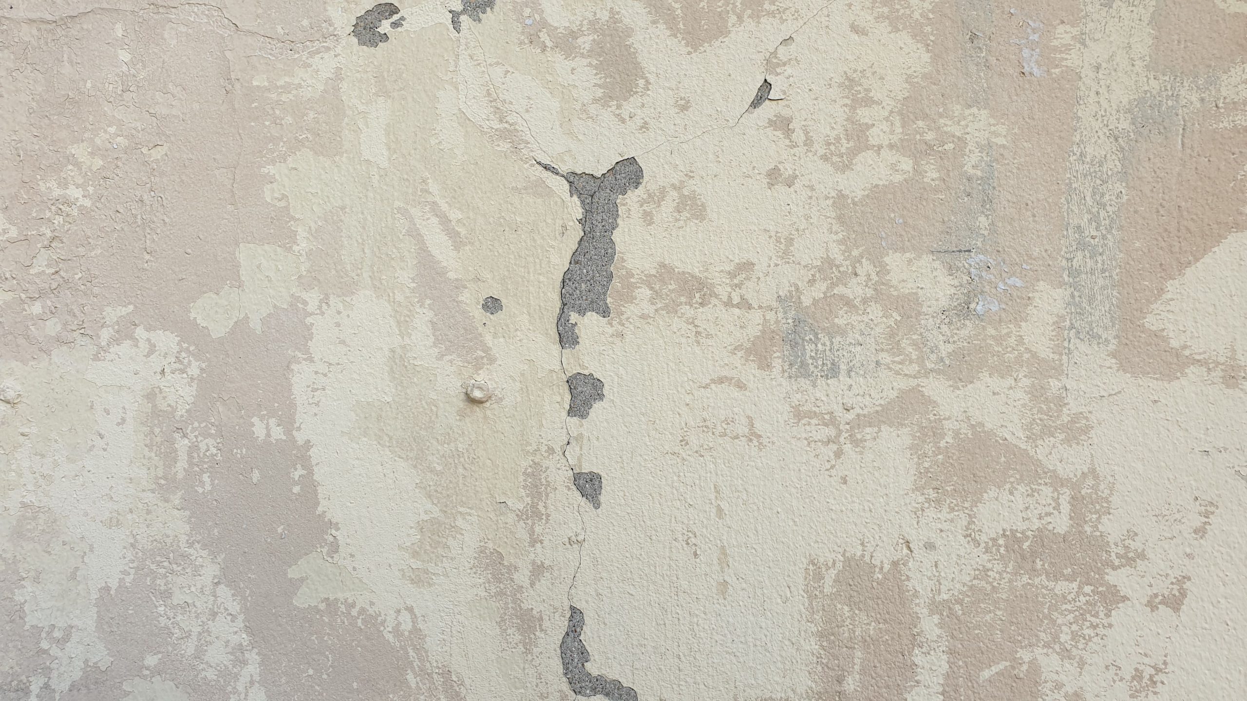 Texture de mur fissuré avec peinture écaillée